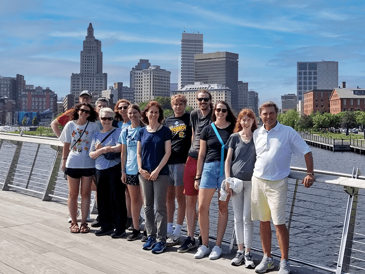 Group of tourists at the Providence River Pedestrian Bridge - a destination included in the Discover Providence Tour.