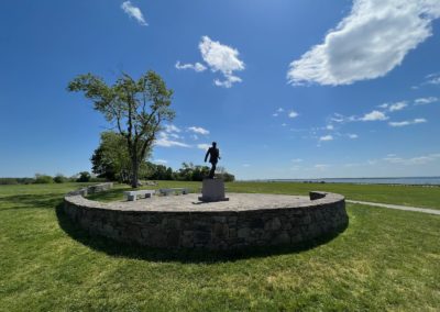 View of John H. Chafee statue at Colt State Park - a destination included in the Life by the Bay Tour.