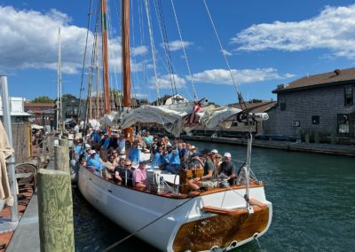 Group of tourists onboard a Schooner - included in the Newport Sail Lunch at Sweet Berry Farm.