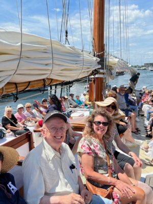 Sail to Mancini Center- Newport Sail and Lunch at Boat House Group of tourists sailing to to Mancini Center- an experience included in Newport Sail and Lunch at Boat House Tour.