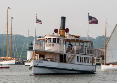 View of the Sabino, the oldest wooden, coal-burning steamboat - an experience included in the Old Time Mystic Tour.