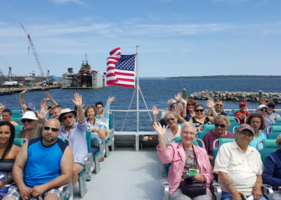 Tourists aboard a Fast Ferry Express - an experience included in the Rhode Island Lighthouse Tour.
