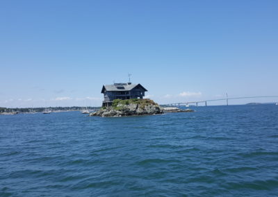View of the Clingstone, house on a rock - a destination included the Rhode Island Lighthouse Cruise Tour.