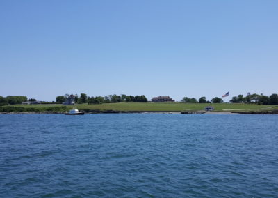 View of the Hammersmith Farm from the harbor - an experience included in the Rhode Island lighthouse Cruise Tour.