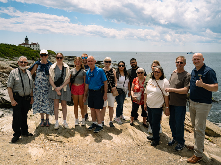 Group of tourists at the Providence River Pedestrian Bridge - a destination included in the Discover Providence Tour.